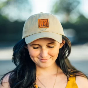 Person wearing grey cap