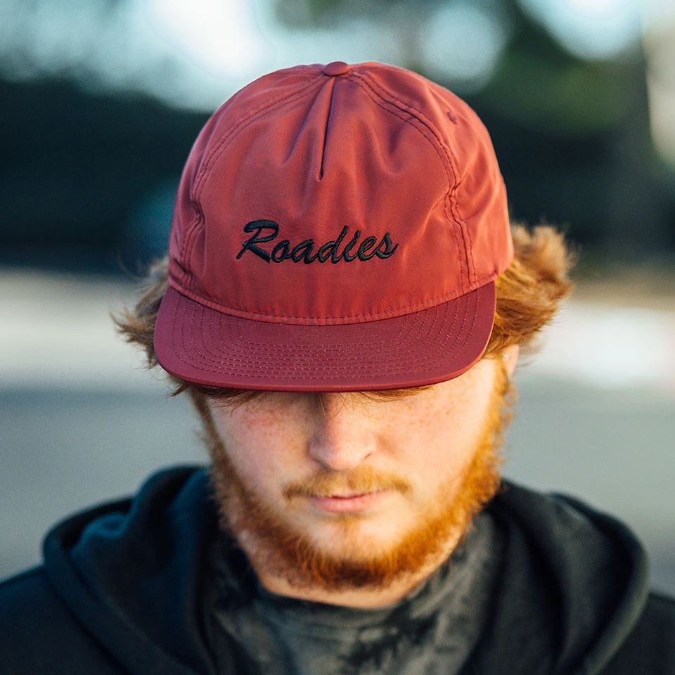 Person wearing red cap