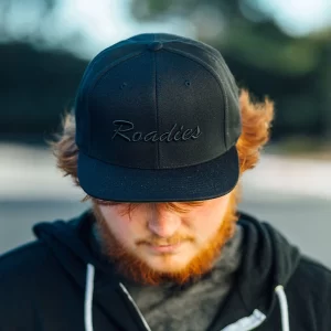 Person wearing black cap