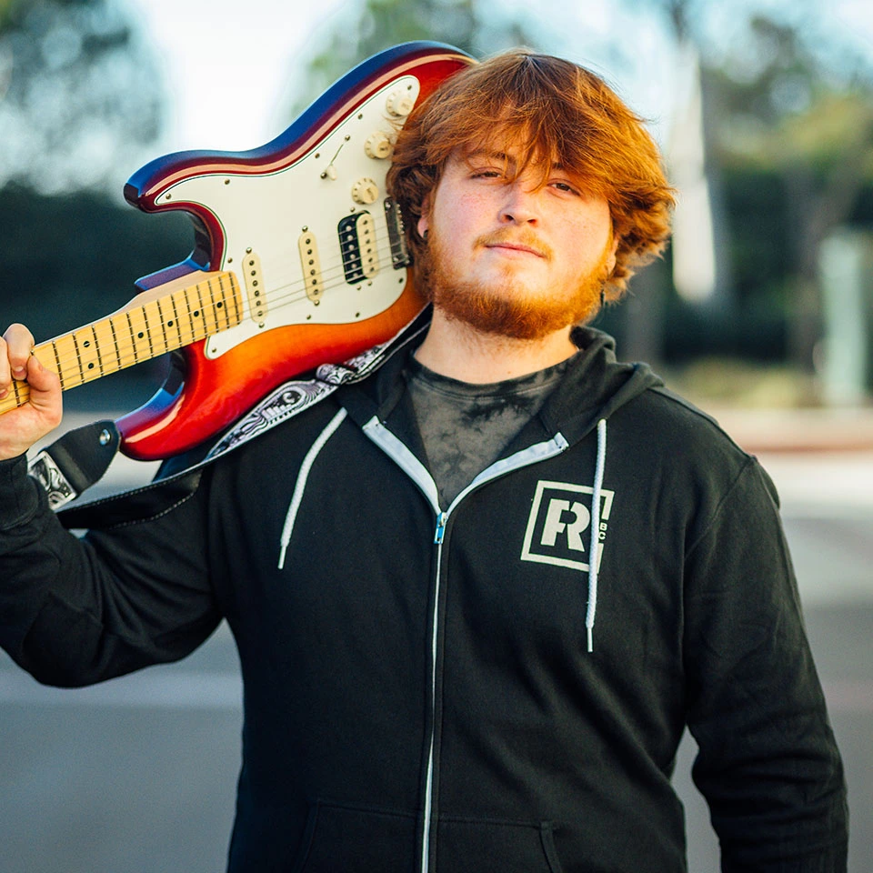 Pearson wearing black zipped hoodie