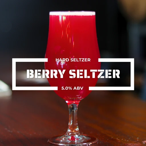 Glass of berry hard seltzer on a counter at the roadies brewing co. in vista CA