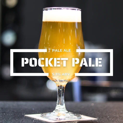 Glass of Pocket Pale on a counter at the roadies brewing co. in vista CA