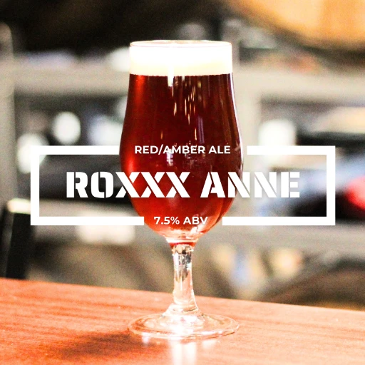 Glass of Roxxx Anne IPA on a counter at the roadies brewing co. in vista CA
