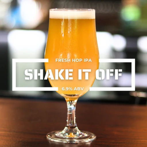 Glass of Shake it Off fresh hop IPA on a counter at the roadies brewing co. in vista CA