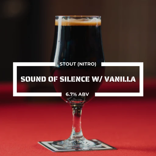 Glass of Sound of Silence vanilla milk stout on a counter at the roadies brewing co. in vista CA