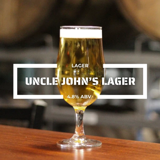 Glass of Uncle Johns lager on a counter at the roadies brewing co. in vista CA